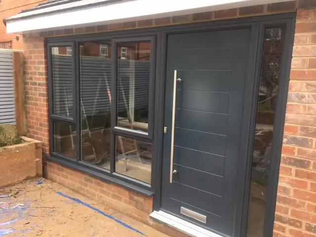 uPVC windows with Composite door in anthracite grey.: Swipe To View More Images