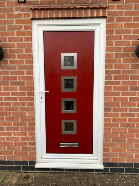 Red uPVC door with white frame.: Swipe To View More Images