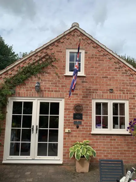 Cream foil with flush sash windows & double door: Swipe To View More Images
