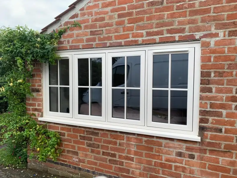 Cream foil flush sash windows.: Swipe To View More Images