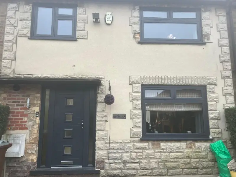 Anthracite grey flush sash with composite door.: Swipe To View More Images