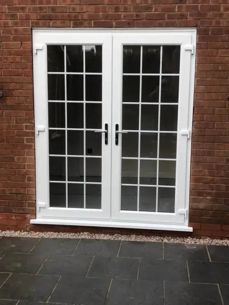 Double doors in white with Georgian bar: Swipe To View More Images