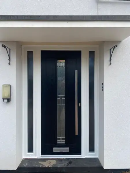 uPVC side panels with composite door in black.: Swipe To View More Images