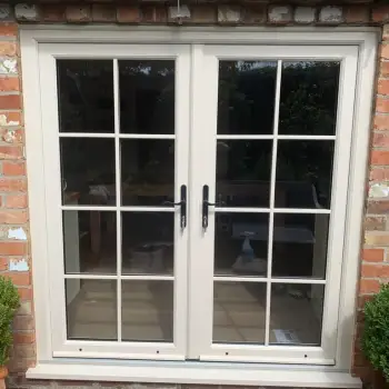 Double doors with Astragal bars in cream foil.: Click Here To View Larger Image