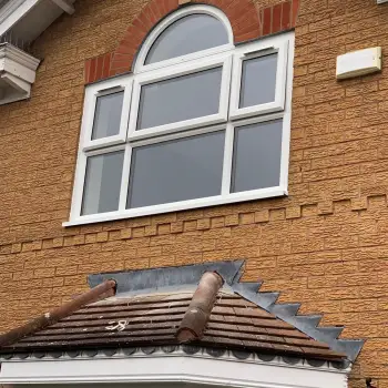 White windows with arched frame above.: Click Here To View Larger Image