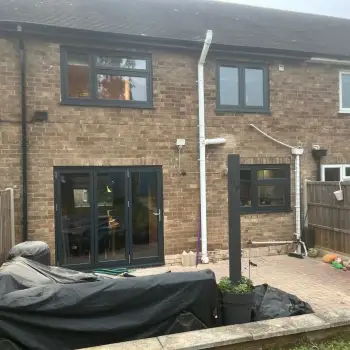 Flush sash Anthracite grey windows with Aluminium bifold door.: Click Here To View Larger Image