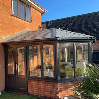 Grey&sol;White conservatory with warm imitation tiled roof&period;: Click Here To View Larger Image